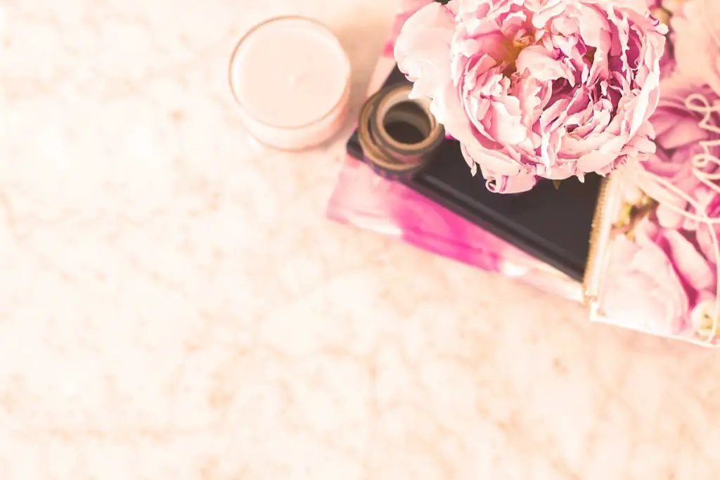 Stack of journals with flower