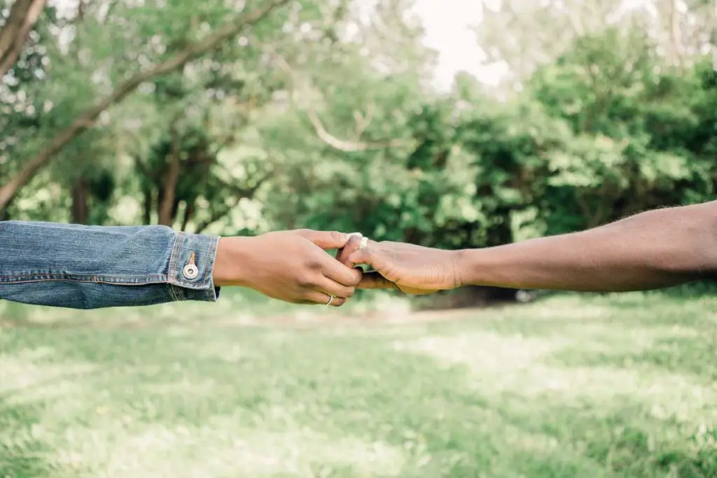 Couple holding hands