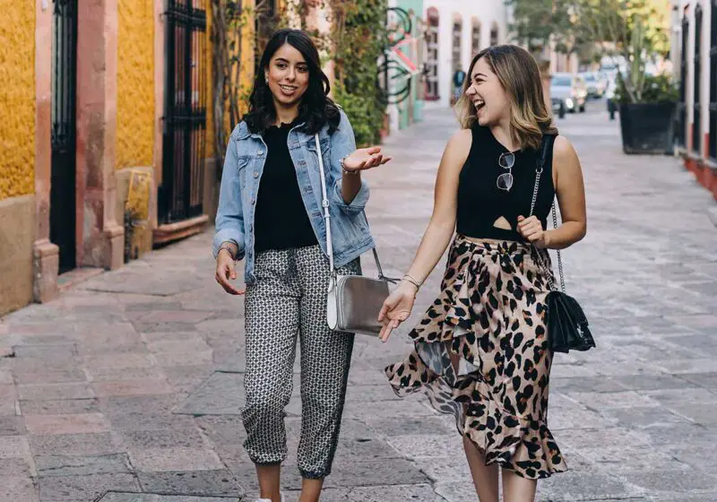 two women talking in street